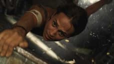 TOMB RAIDER: Alicia Vikander Hangs On For Her Life In These Two Intense New Clips