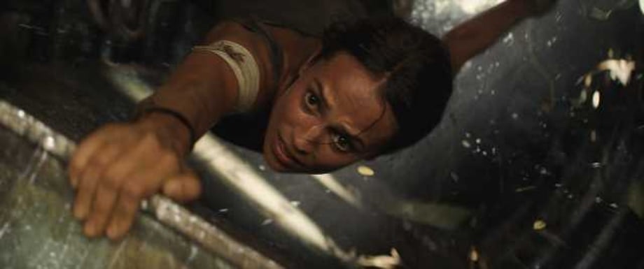 TOMB RAIDER: Alicia Vikander Hangs On For Her Life In These Two Intense New Clips